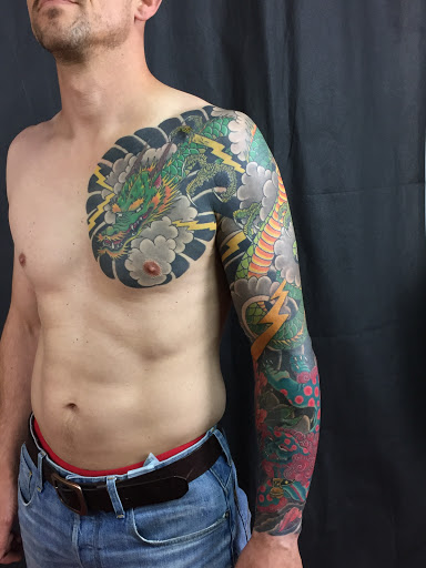 Explore back tattoo ideas for women, creative tattoo ideas in Norfolk, available at Commonwealth Tattoo Gallery