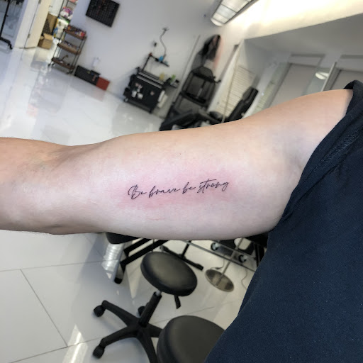 Explore tattoo ideas for women flower, creative tattoo ideas in Orange, available at Baron Art Tattoo