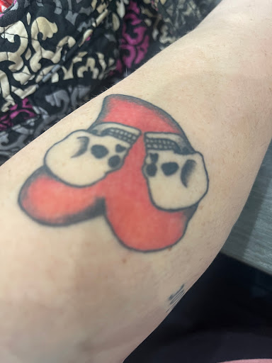 Explore child's name tattoo ideas, creative tattoo ideas in Macomb, available at Nevermore Tattoo Gallery