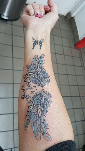 Explore tattoos ideas for black females, creative tattoo ideas in Huntsville, available at The Purple Goat Tattoos