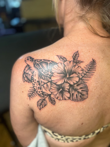 Explore back of head tattoo ideas, creative tattoo ideas in Eureka Springs, available at Sailors Luck Tattoo