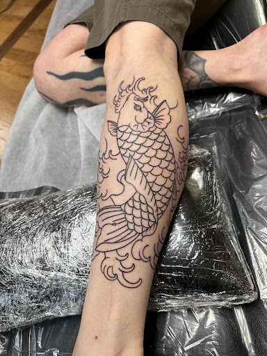 Explore shoulder blade tattoo ideas, creative tattoo ideas in Magnolia, available at Mr. Grays Tattoo Studio