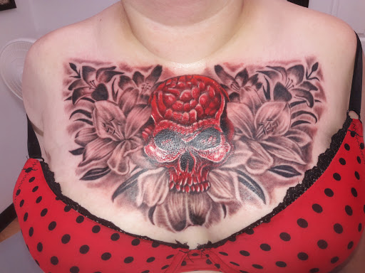 Explore bookworm tattoo ideas, creative tattoo ideas in Georgetown, available at Body Art Tattoos