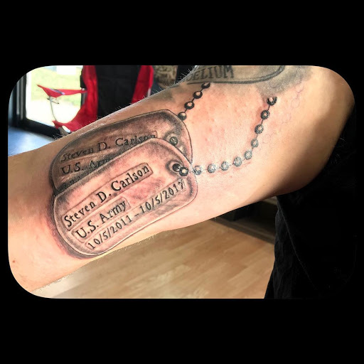 Explore religious tattoo ideas for guys, creative tattoo ideas in Vermillion, available at IKTOMI-INK Tattoo Experience