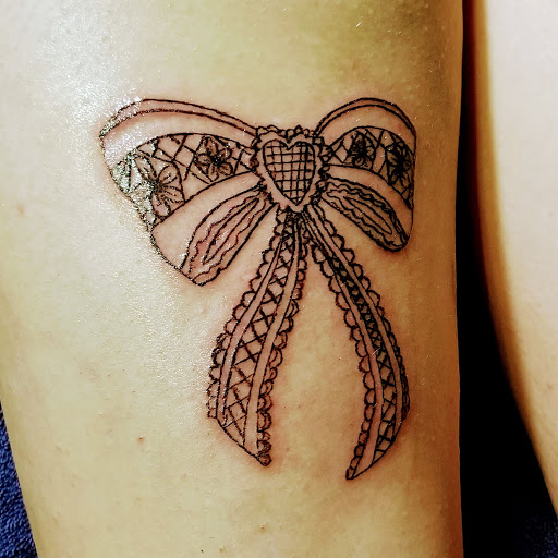 Explore lion forearm tattoo ideas, creative tattoo ideas in Canyon Lake, available at Timeless Tattoos L.L.C.
