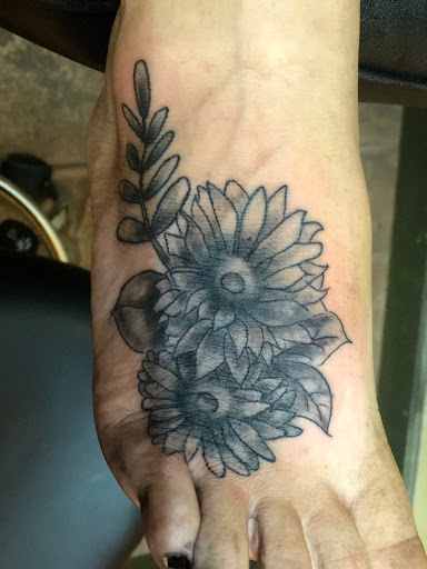 Explore men neck tattoo ideas, creative tattoo ideas in Okeechobee, available at Muck City Tattoos & Piercings