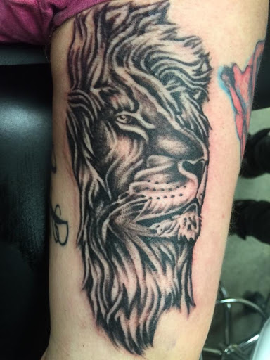 Find owl tattoo ideas for men for your next unique tattoo in Muncie at The Tattoo Studio