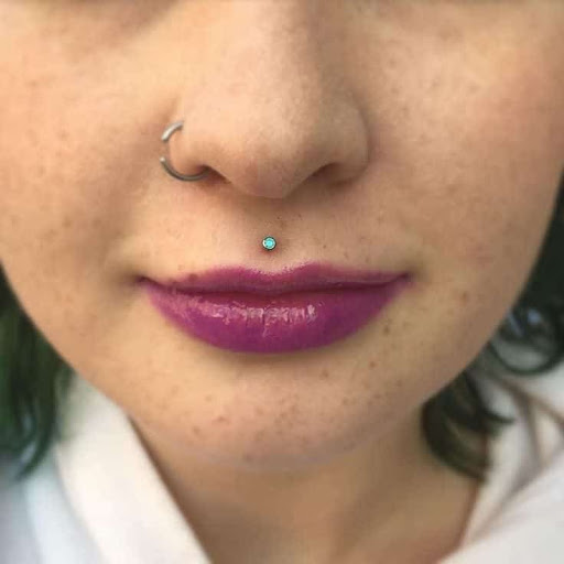 Explore drag race tattoo ideas, creative tattoo ideas in Elko, available at Tom Custom Tattoos and Body Piercing Studio
