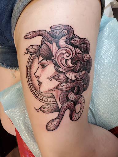 Explore galaxy tattoo ideas, creative tattoo ideas in Peoria, available at Guerrilla Ink Tattoos