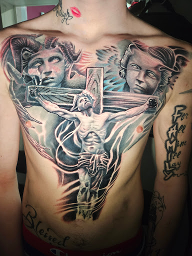 Explore 2024 tattoos ideas, creative tattoo ideas in Angola, available at Hoodlum Ink