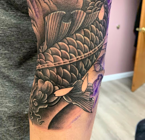 Explore little hand tattoo ideas, creative tattoo ideas in Kenosha, available at Kenosha Tattoo Company