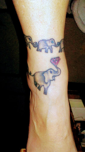 Explore dolly parton tattoo ideas, creative tattoo ideas in Fenton, available at inkbox tattoos