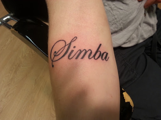 Explore male inner bicep tattoo ideas, creative tattoo ideas in La Crosse, available at La Crosse Tattoo