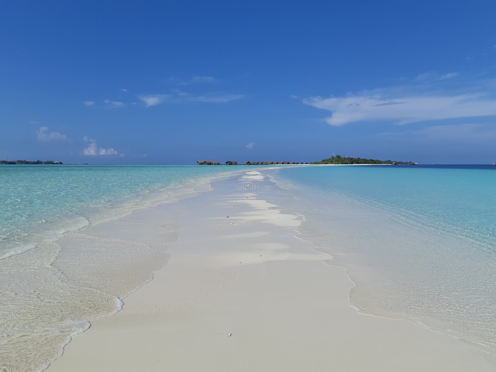Foto de Como Resort Island com praia espaçosa