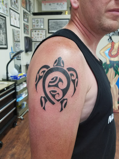 Explore lion chest tattoo ideas, creative tattoo ideas in Kihei, available at Paradise Tattoo