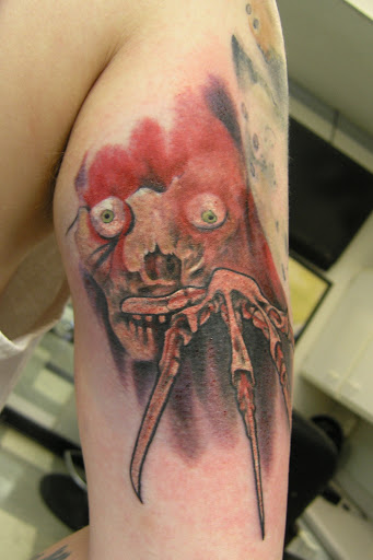 Explore donut tattoo ideas, creative tattoo ideas in Omaha, available at American Tattoo & Body Piercing