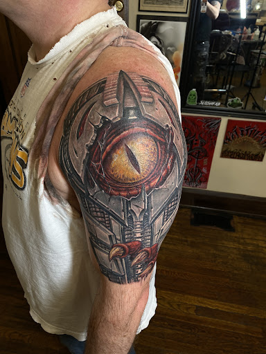 Explore tattoo ideas for women thigh, creative tattoo ideas in Canton, available at The Inkeepers Tattoo Parlor