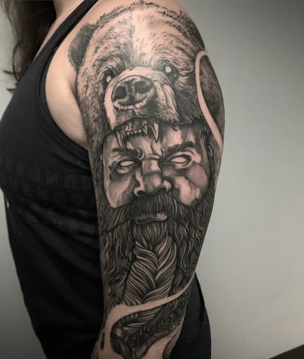 Explore leg tattoo men ideas, creative tattoo ideas in Altoona, available at Electric Wave Tattoo