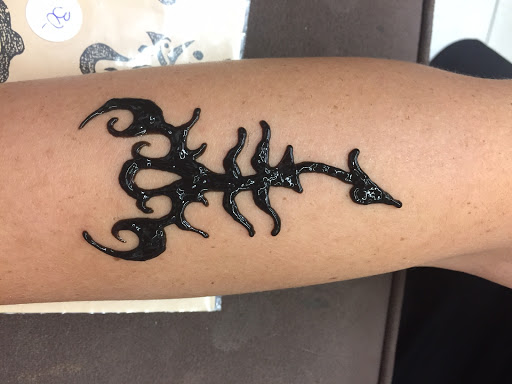 Explore photographer tattoo ideas, creative tattoo ideas in South Padre Island, available at Peggys Temporary & Permanent Tattoos