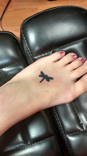 Explore knee tattoo ideas for woman, creative tattoo ideas in Cincinnati, available at Skincraft