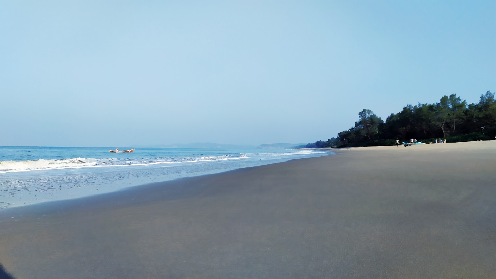 Photo de Kadle Beach avec droit et long