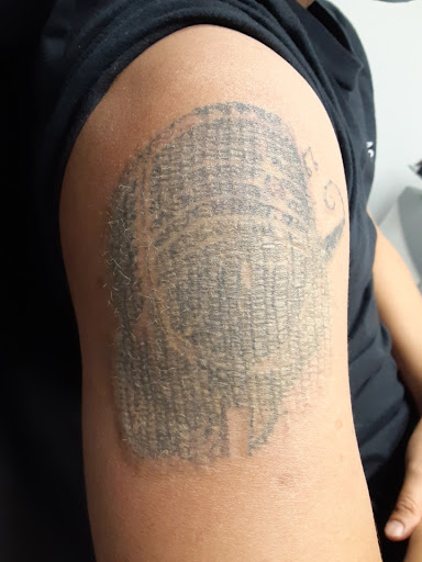 Explore tattoo cover up ideas for cross, creative tattoo ideas in Saint Paul, available at Fearless Tattoo Removal