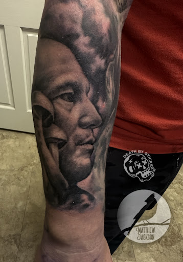 Explore mens rose tattoo ideas, creative tattoo ideas in Nashville, available at RedBird Tattoo