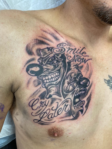 Explore guitar tattoo ideas, creative tattoo ideas in Aurora, available at Ronin Tattoo Studio INC