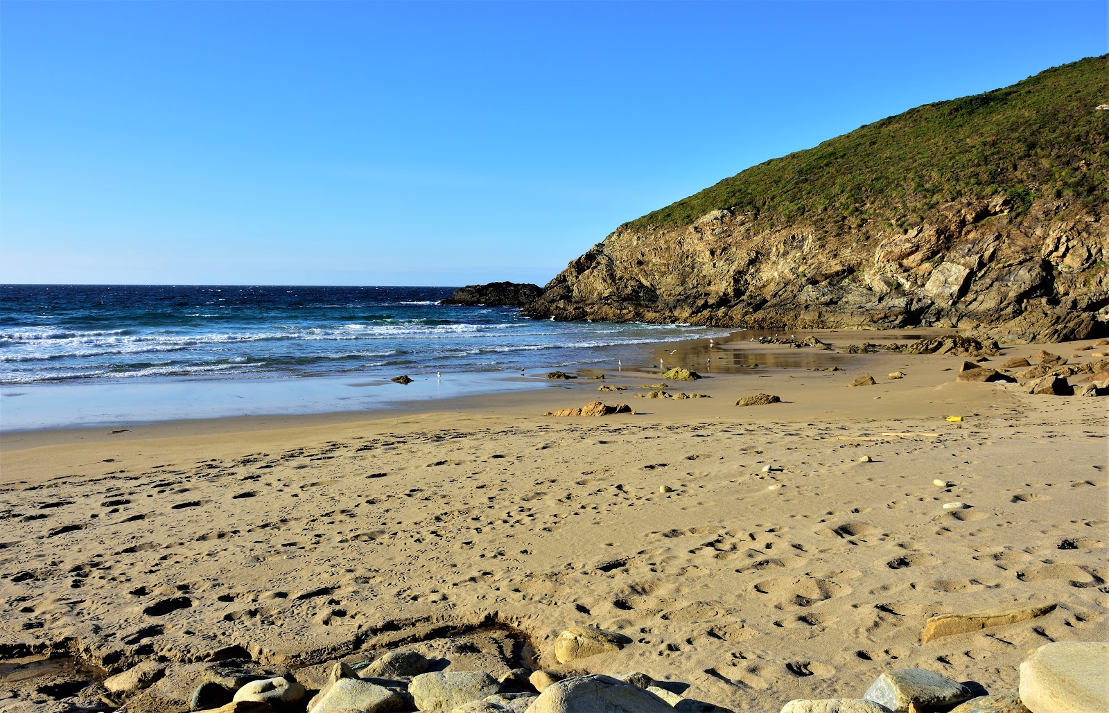 Foto van San Miro Beach met helder fijn zand oppervlakte