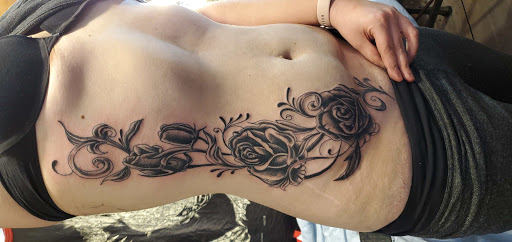 Explore small one piece tattoo ideas, creative tattoo ideas in Kerhonkson, available at RedHawk Tattoos