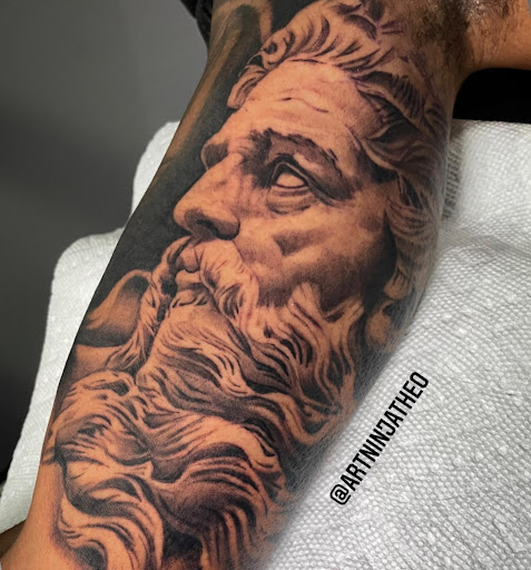 Explore chest tattoo filler ideas, creative tattoo ideas in Atlanta, available at Golden Anchor Tattoo