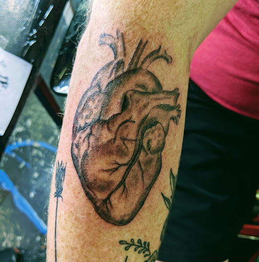 Explore crime scene tattoo ideas, creative tattoo ideas in Redding, available at Caddy Daddys