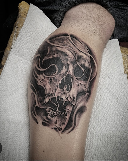 Explore graduation tattoo ideas, creative tattoo ideas in Cedar Falls, available at The Iron Quill Tattoo Parlor