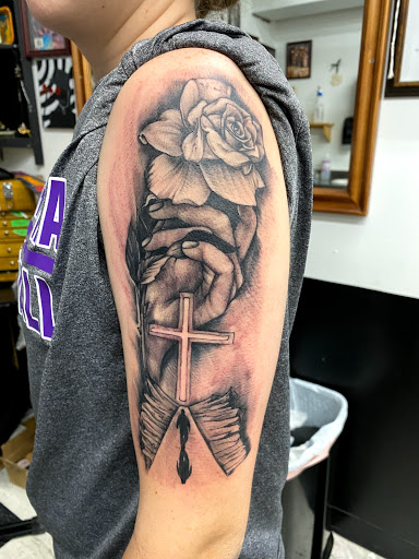 Explore hand tattoo ideas men, creative tattoo ideas in Lawton, available at Impact Ink Tattoo Studios