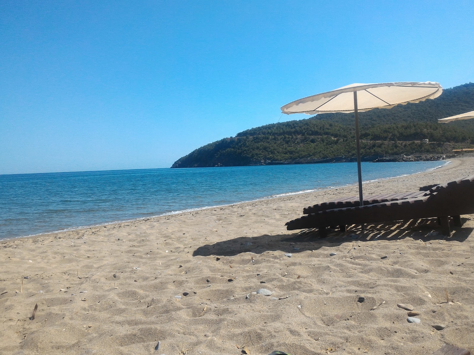 Photo of Buyukeceli beach with turquoise pure water surface