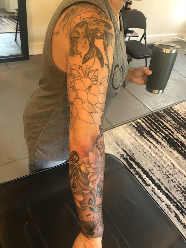 Explore chin tattoo ideas, creative tattoo ideas in Kingston, available at Innovative Ink Tattoo & SMP