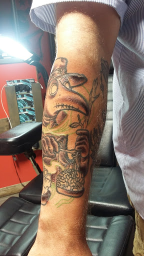 Explore zodiac tattoo ideas for men, creative tattoo ideas in Gadsden, available at Old School Ink Electric Tattooing