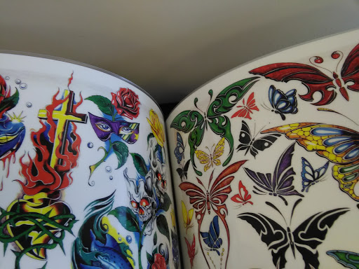 Explore feminine neck tattoo ideas, creative tattoo ideas in Elyria, available at Body Revolution Tattoos & Body Piercings