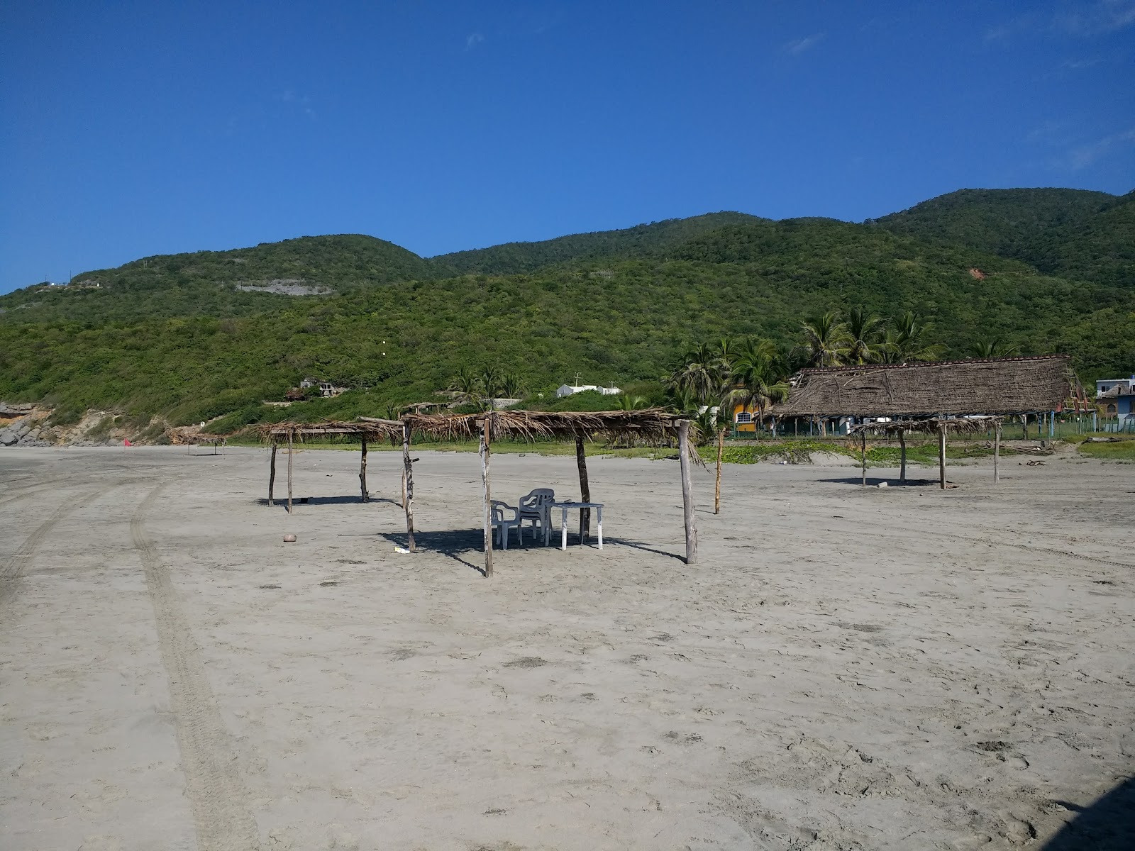 Foto de Playa las Brisas e o assentamento