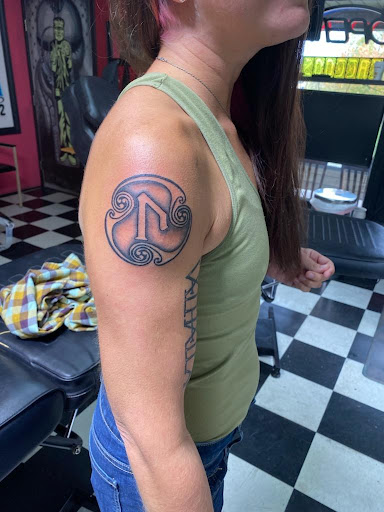 Tattoo Shop «Art In Motion Inc Tattooing», reviews and photos, 415 S Broadway St, Medina, OH 44256, USA