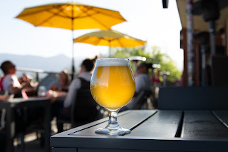 Friends sharing beers at a table