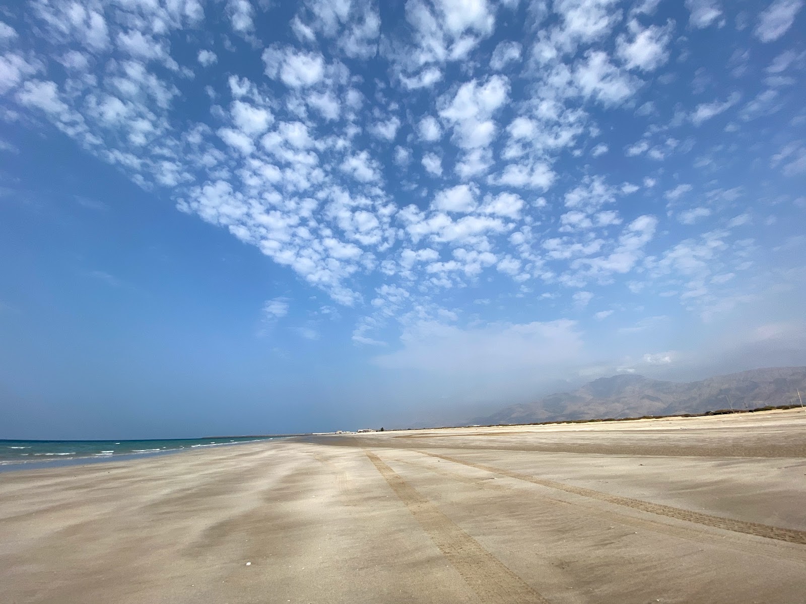 Fotografija Al Rams beach z turkizna čista voda površino