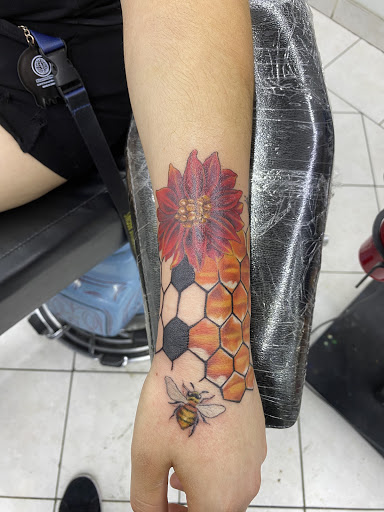 Explore shoulder sleeve tattoo ideas, creative tattoo ideas in Sparks, available at Tidal Wave Tattoo