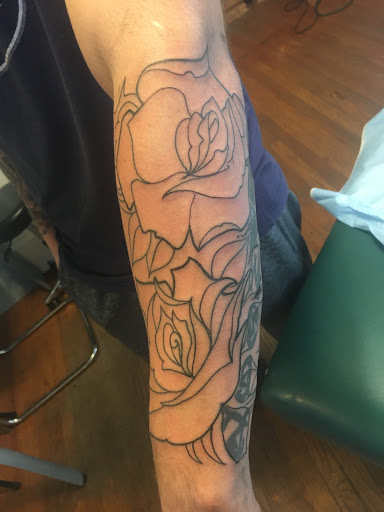 Explore playing card tattoo ideas, creative tattoo ideas in Milford, available at Golden Hammer Tattoo Studios