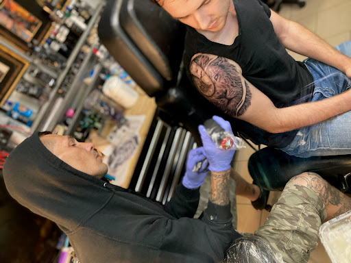 Explore dainty finger tattoo ideas, creative tattoo ideas in Sarasota, available at SEVEN SINS Tattoo Studio