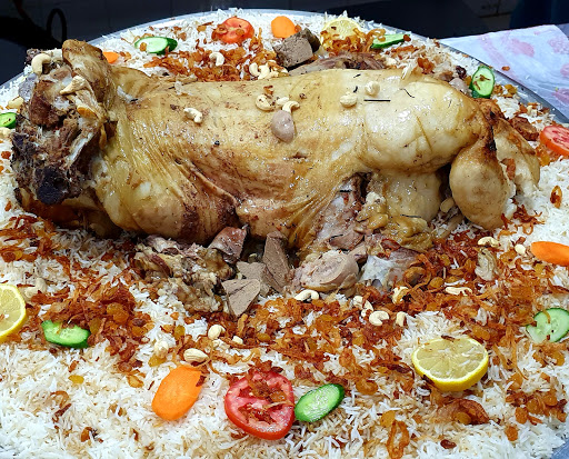 مطعم رجال المع الثقبه شارع الخامس والعشرين 