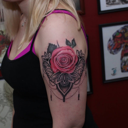Explore henna tattoo ideas for guys, creative tattoo ideas in Kingsford, available at Deft Tattoo Studio