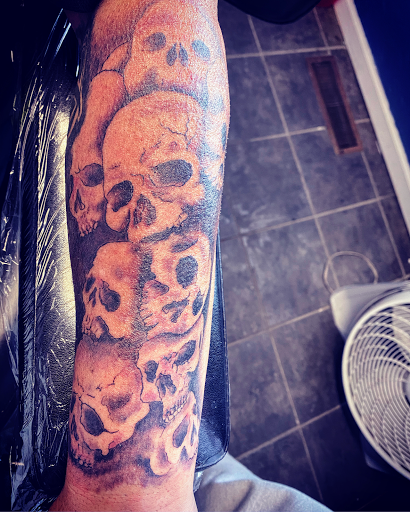 Explore tattoo ideas sports, creative tattoo ideas in Dalton, available at Unkut Productions Inc Tattoo Piercing Studio