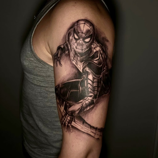 Find garter belt tattoo ideas for your next unique tattoo in Katy at Artistic Impressions Tattoo Studio