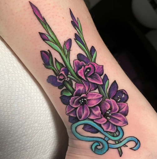 Explore calla lily tattoo ideas, creative tattoo ideas in Oklahoma City, available at Gold Fang Gallery